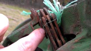 Help me fix the knotter on my John Deere 14T baler [upl. by Winwaloe]