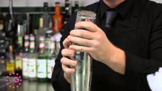 Mixology School  How to make a Cosmopolitan [upl. by Nevaed496]